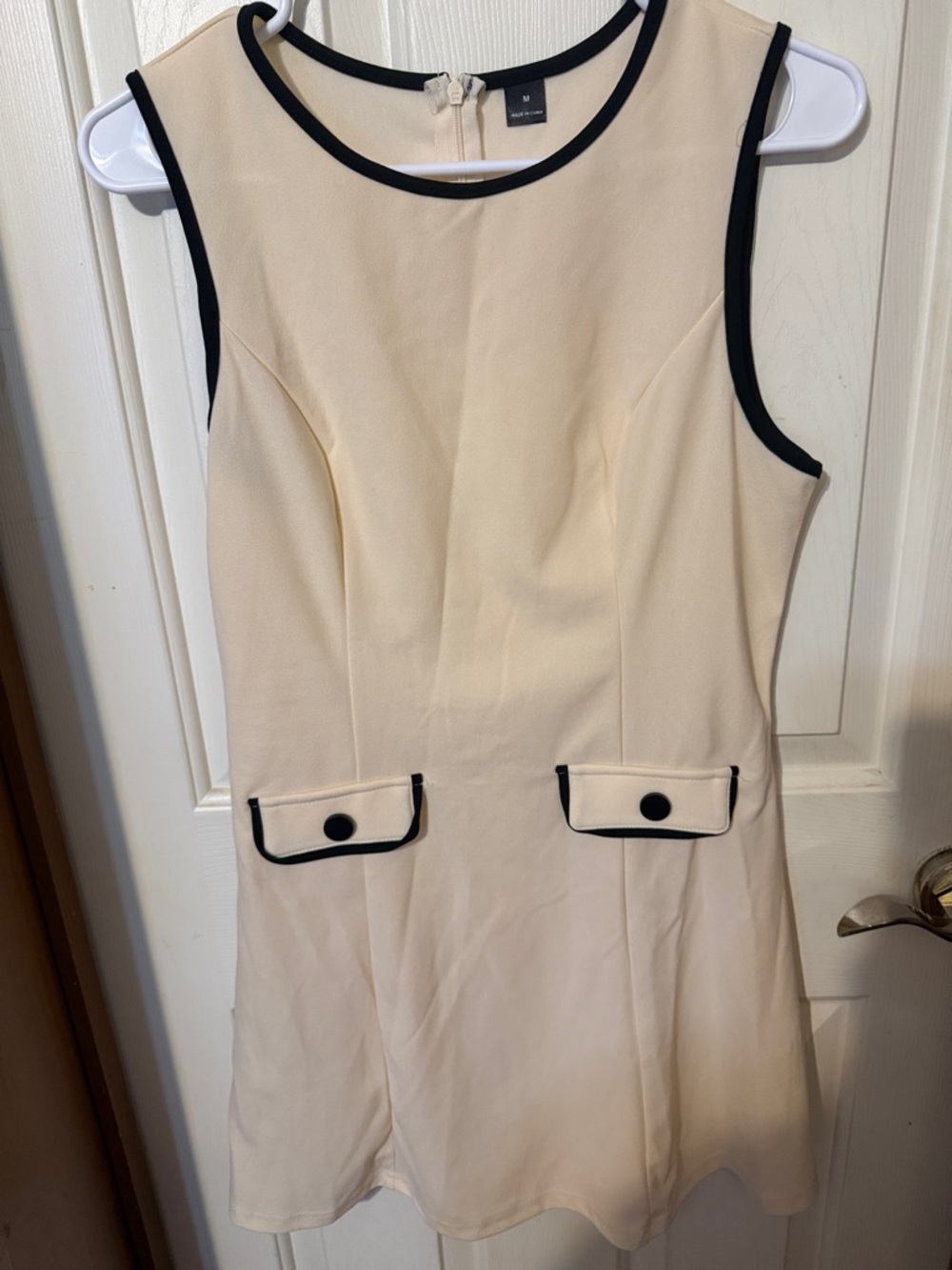 Cream Sleeveless Shift Dress with Black Trim